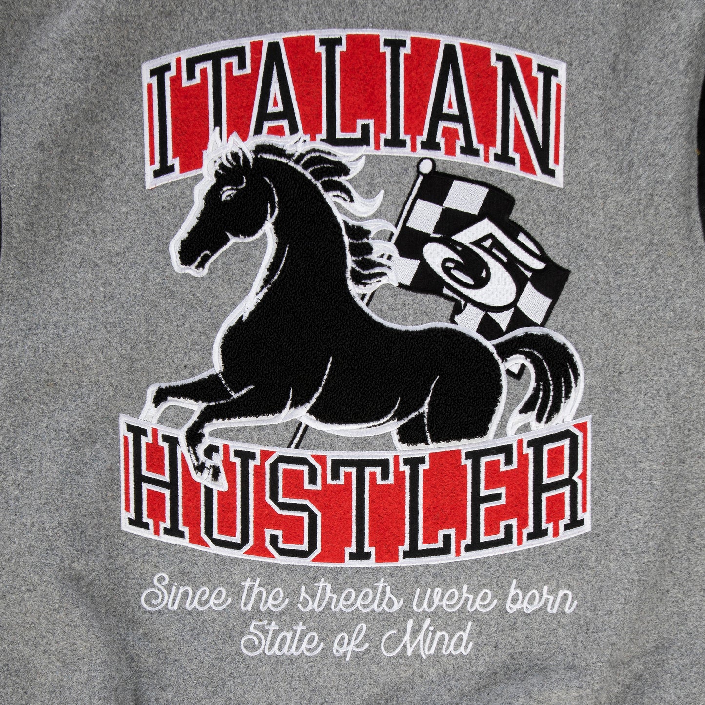 "ITALIAN HUSTLER" by Guè Varsity Dark Grey