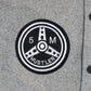 "ITALIAN HUSTLER" von Guè Varsity Dark Grey