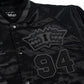"5OM x SXM" XXX Jubiläums-Bomberjacke Schwarz